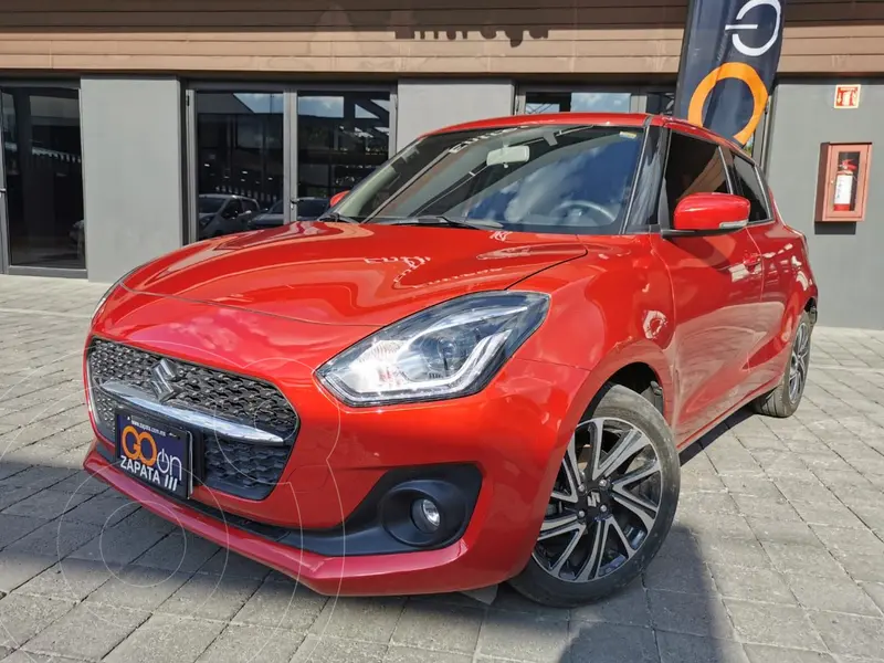 Foto Suzuki Swift GLX usado (2021) color Rojo financiado en mensualidades(enganche $81,250 mensualidades desde $7,936)