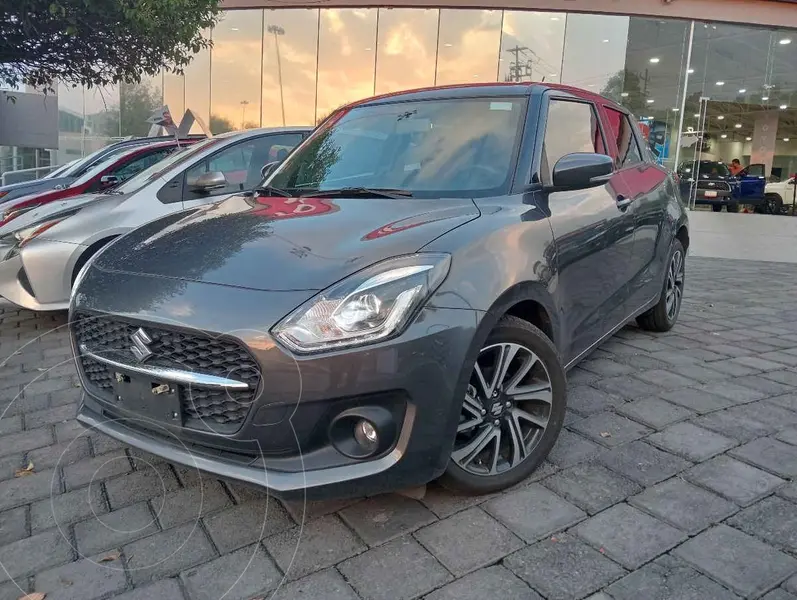 Foto Suzuki Swift GLX usado (2024) color Gris financiado en mensualidades(enganche $80,598 mensualidades desde $8,577)