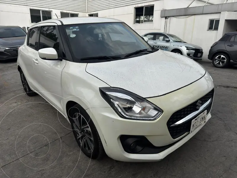 Foto Suzuki Swift GLX usado (2024) color Blanco financiado en mensualidades(enganche $60,000)