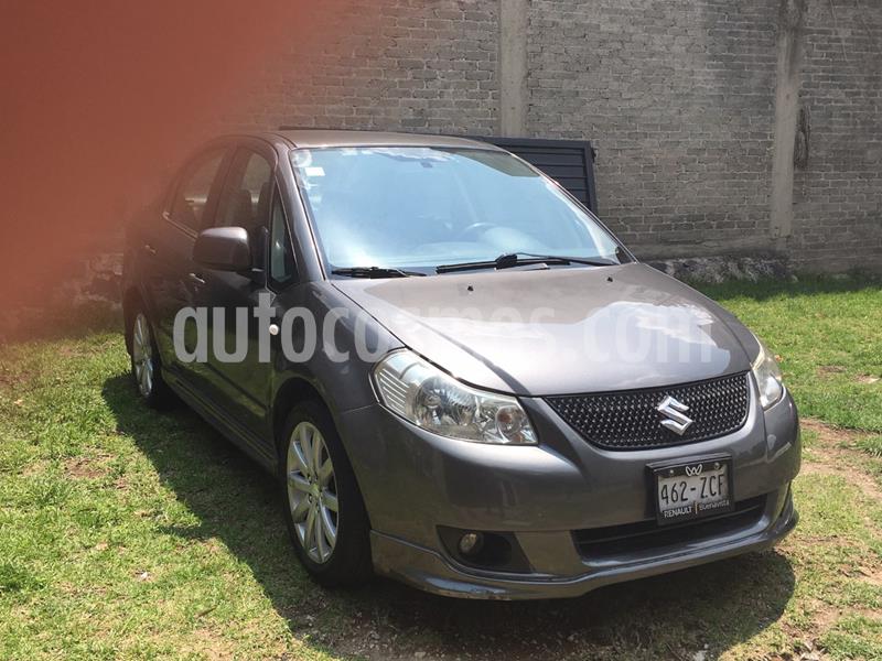 foto Suzuki SX4 Sedán 2.0L Aut. usado (2012) color Gris precio $97,500