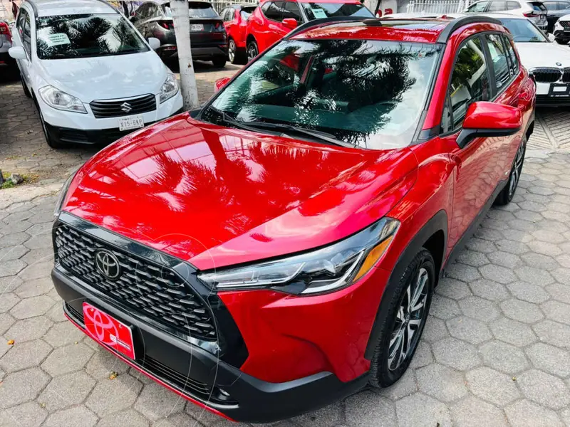 Foto Toyota Corolla Cross HEV LE usado (2024) color Rojo financiado en mensualidades(enganche $147,006 mensualidades desde $13,058)