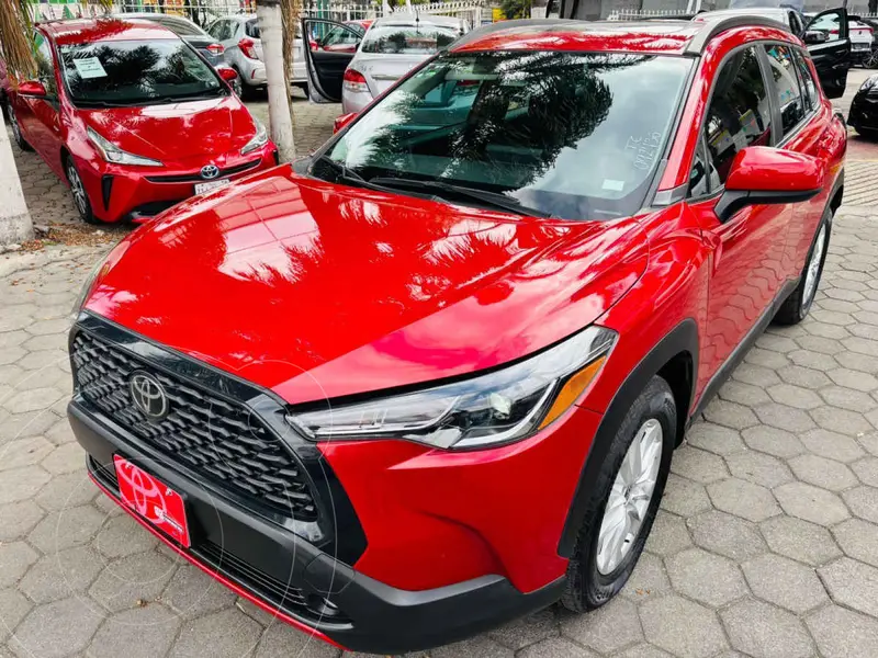 Foto Toyota Corolla Cross LE usado (2024) color Rojo financiado en mensualidades(enganche $125,506 mensualidades desde $11,148)