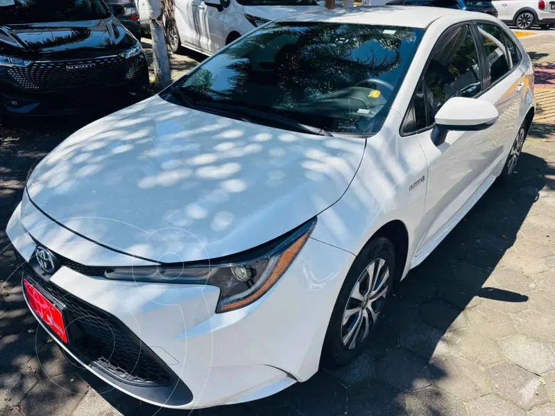 Foto Toyota Corolla HEV Hybrid usado (2021) color Blanco financiado en mensualidades(enganche $101,319 mensualidades desde $8,999)