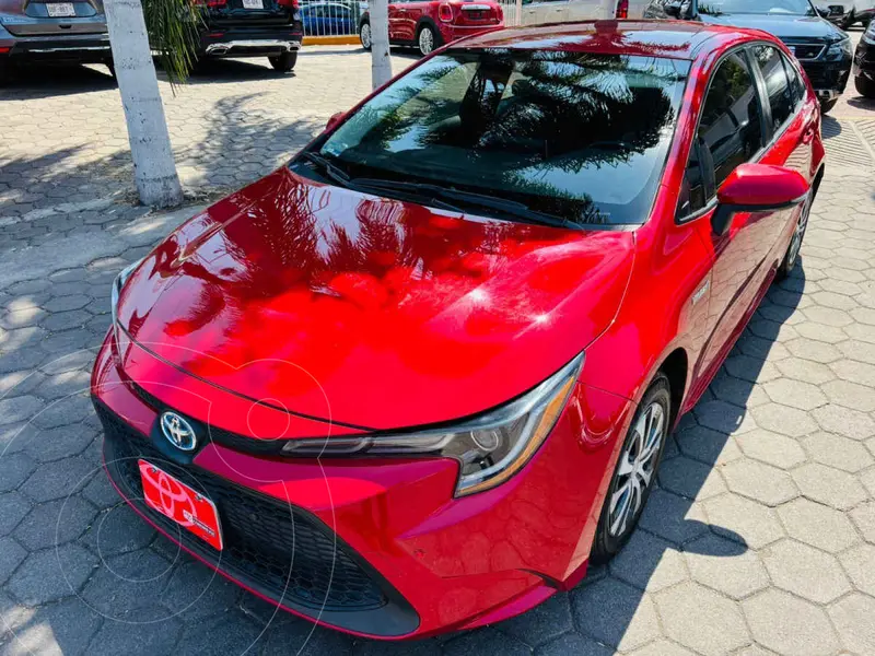 Foto Toyota Corolla HEV Hybrid usado (2021) color Rojo financiado en mensualidades(enganche $95,944 mensualidades desde $8,522)