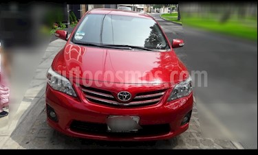 Foto Toyota Corolla 1.6 GLI Aut usado (2013) color Rojo precio u$s12,500