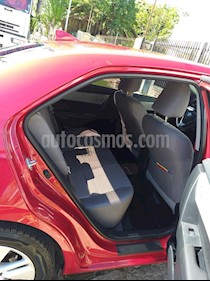 foto Toyota Corolla 1.8 XEi usado (2014) color Rojo precio $665.000