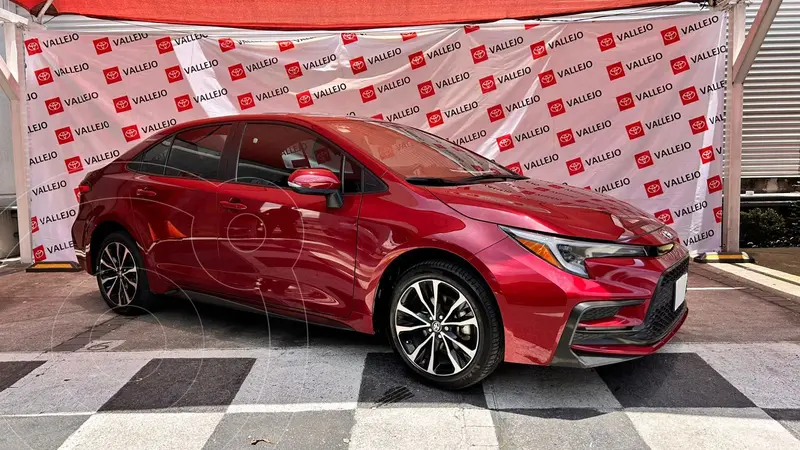 Foto Toyota Corolla SE Aut usado (2024) color Rojo financiado en mensualidades(enganche $200,640 mensualidades desde $8,620)