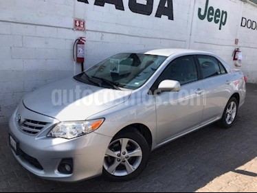 foto Toyota Corolla 4P XLE 1.8L TA A/AC. VE CD ABS RA 16 usado (2013) color Plata precio $150,000
