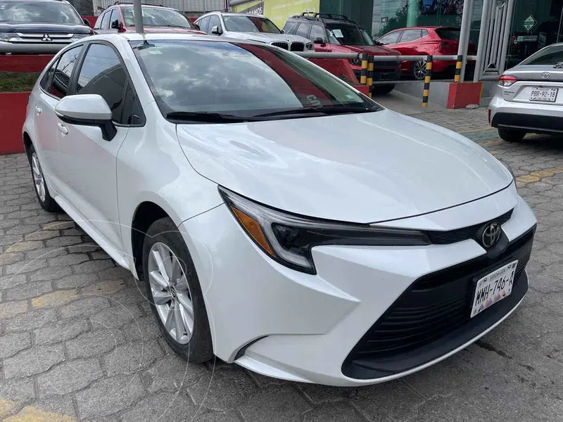 Foto Toyota Corolla XLE Aut usado (2024) color Blanco financiado en mensualidades(enganche $126,312 mensualidades desde $10,665)