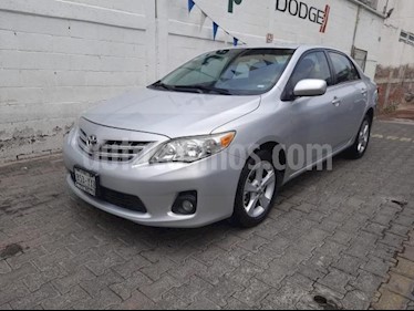 foto Toyota Corolla 4P XLE 1.8L TA A/AC. VE CD ABS RA 16 usado (2013) color Plata precio $150,000