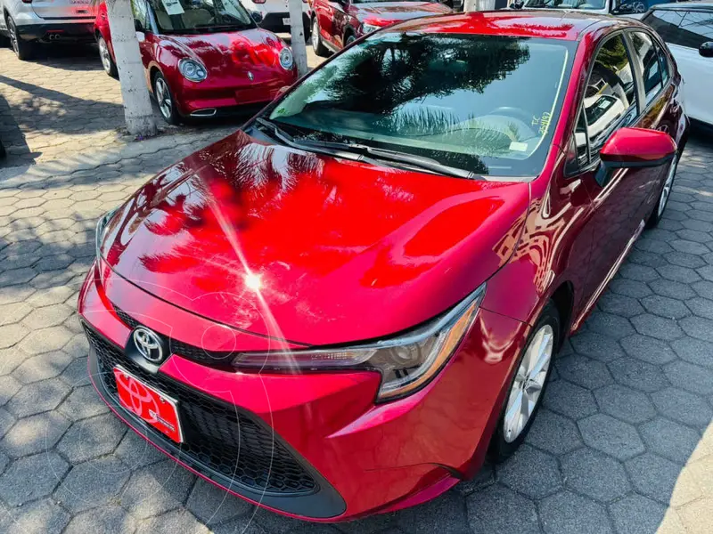 Foto Toyota Corolla LE Aut usado (2022) color Rojo financiado en mensualidades(enganche $93,794 mensualidades desde $8,331)