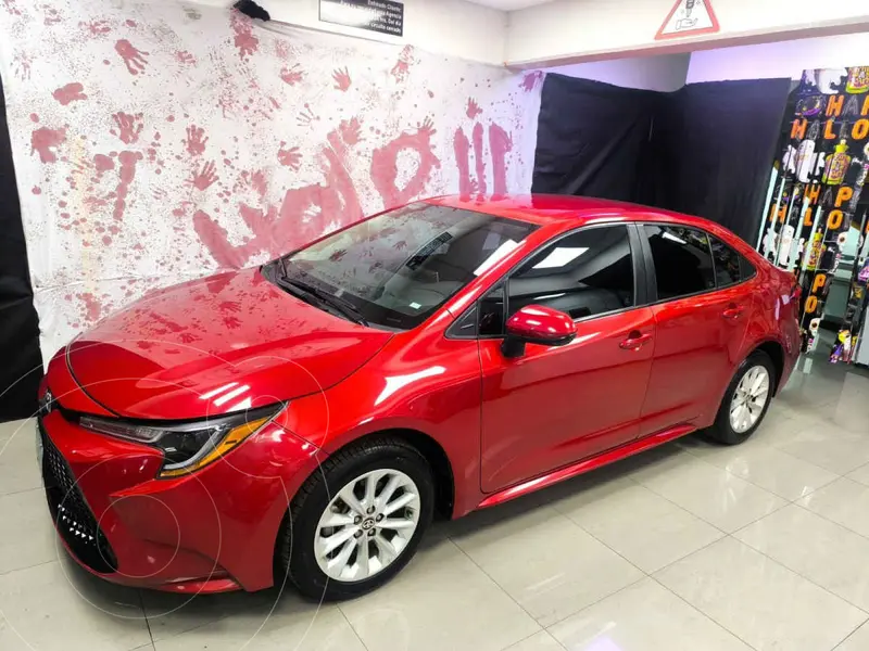 Foto Toyota Corolla LE 1.8L Aut usado (2020) color Rojo financiado en mensualidades(enganche $67,320 mensualidades desde $6,641)
