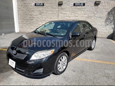 Toyota Corolla 4P XLE 1.8L TA A/AC. VE CD ABS RA 16 usado (2009) color Negro precio $90,000