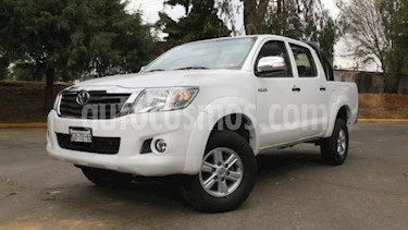 Toyota Hilux 4P DOBLE CAB MID TM5 A/AC VE RA-15 usado (2014) color Blanco precio $219,000
