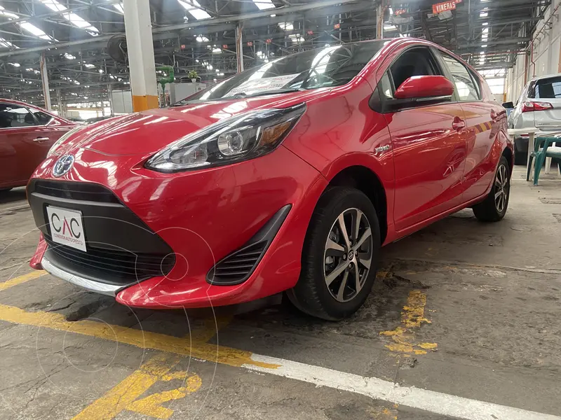 Foto Toyota Prius C 1.5L usado (2020) color Rojo financiado en mensualidades(enganche $73,650 mensualidades desde $7,856)