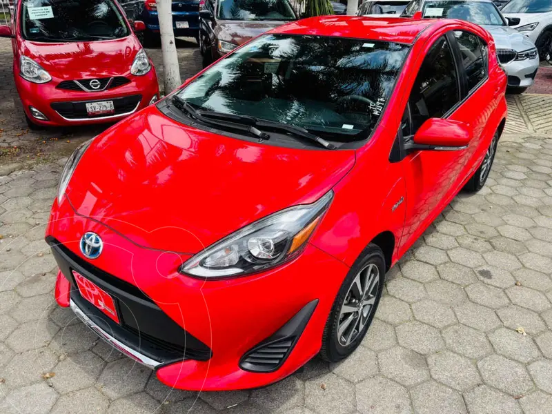 Foto Toyota Prius C 1.5L usado (2021) color Rojo financiado en mensualidades(enganche $93,256 mensualidades desde $8,283)