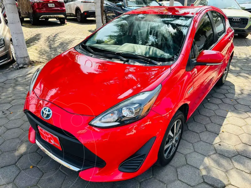Foto Toyota Prius C 1.5L usado (2021) color Rojo financiado en mensualidades(enganche $85,194 mensualidades desde $7,567)