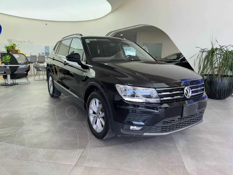 Foto Volkswagen Tiguan Comfortline 5 Asientos Piel usado (2021) color Negro financiado en mensualidades(enganche $92,880 mensualidades desde $9,859)