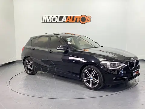BMW Serie 1 118I SPORT  5 P. usado (2013) color Negro precio u$s17.000