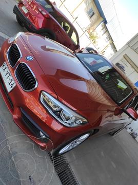 BMW Serie 1 118i Aut Millenial Nav 5P usado (2019) color Naranja precio $21.500.000