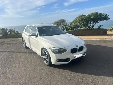 BMW Serie 1 114i 5P usado (2015) color Blanco precio $14.490.000