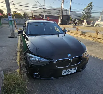 BMW Serie 1 114i 5P usado (2014) color Negro precio $10.000.000