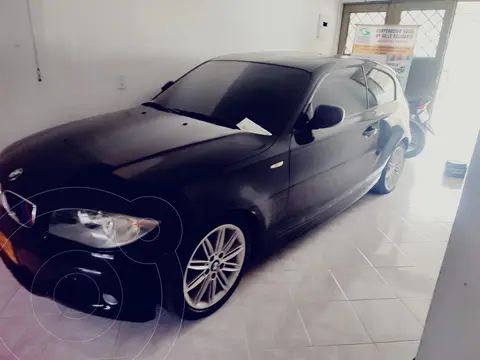 BMW Serie 1 120i usado (2012) color Negro precio $55.000.000