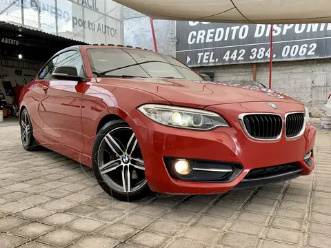 BMW Serie 2 Coupe 220iA Sport Line Aut usado (2015) color Rojo Melbourne financiado en mensualidades(enganche $207,122 mensualidades desde $8,870)