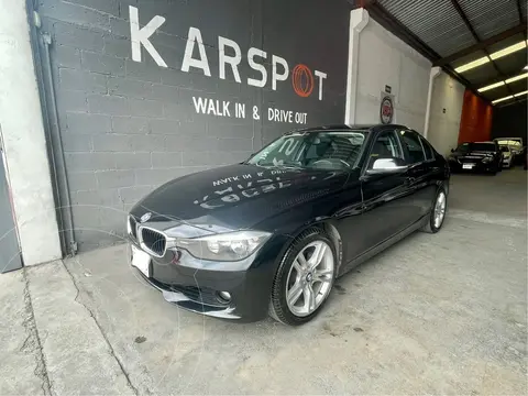 BMW Serie 3 320iA Sport Line usado (2015) color Negro financiado en mensualidades(enganche $75,407 mensualidades desde $5,496)
