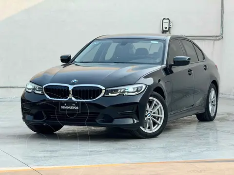 BMW Serie 3 330e usado (2021) color Negro financiado en mensualidades(enganche $151,800 mensualidades desde $11,840)