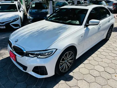 BMW Serie 3 330e usado (2021) color Blanco financiado en mensualidades(enganche $200,756 mensualidades desde $17,832)