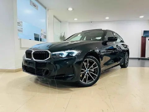 BMW Serie 3 330e usado (2024) color Negro financiado en mensualidades(enganche $222,800 mensualidades desde $17,378)