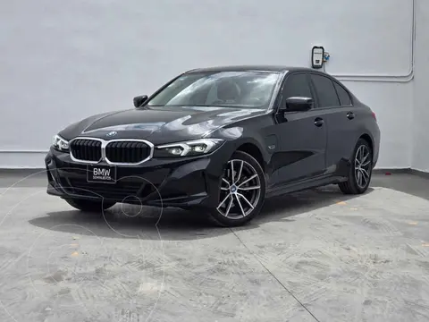 BMW Serie 3 330e usado (2024) color Negro financiado en mensualidades(enganche $219,780 mensualidades desde $21,681)