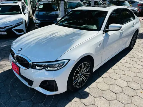 BMW Serie 3 330e usado (2021) color Blanco financiado en mensualidades(enganche $152,381 mensualidades desde $13,535)