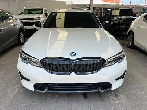 BMW Serie 3 330iA Sport Line Plus usado (2019) color Blanco financiado en mensualidades(enganche $140,000 mensualidades desde $19,688)