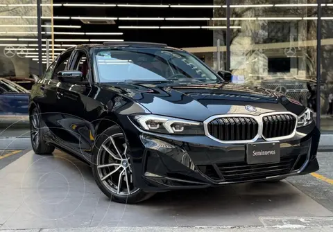 BMW Serie 3 330e usado (2024) color Negro financiado en mensualidades(enganche $346,940 mensualidades desde $14,905)