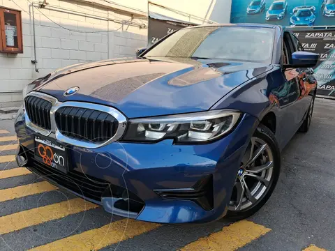 BMW Serie 3 320i usado (2021) color Azul Marino financiado en mensualidades(enganche $147,150 mensualidades desde $11,252)