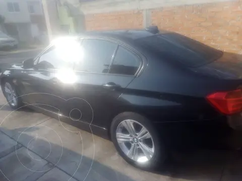BMW Serie 3 320i Lujo usado (2014) color Negro precio $290,000