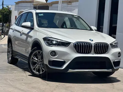 BMW X1 sDrive 20iA X Line usado (2019) color Blanco Alpine financiado en mensualidades(enganche $81,857 mensualidades desde $11,435)