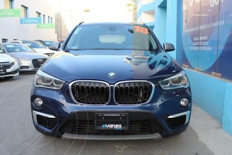 foto BMW X1 sDrive 18iA financiado en mensualidades enganche $137,700 