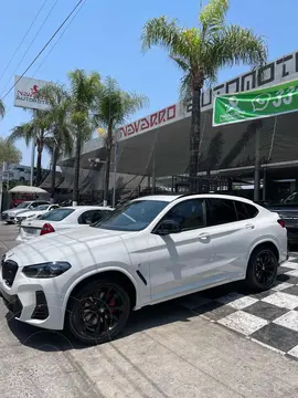 BMW X4 M40i usado (2024) color Blanco Mineral financiado en mensualidades(enganche $449,975 mensualidades desde $38,065)