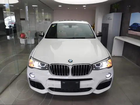 BMW X4 M40iA Aut usado (2018) color Blanco financiado en mensualidades(enganche $140,000 mensualidades desde $95,000)