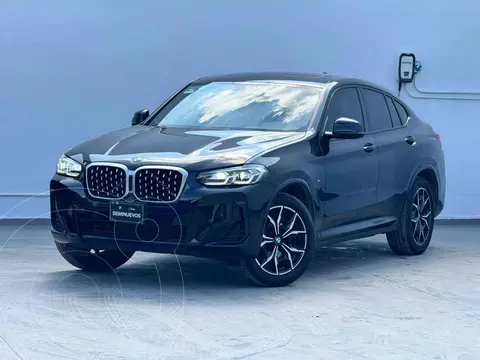 BMW X4 xDrive30i usado (2024) color Negro financiado en mensualidades(enganche $263,780 mensualidades desde $26,022)