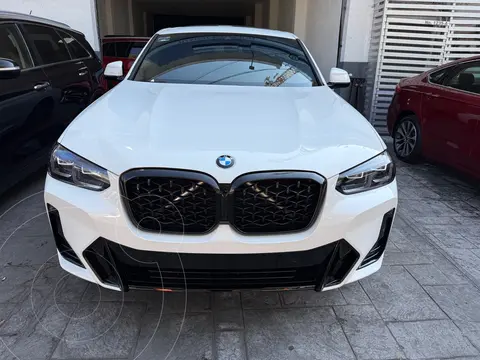 BMW X4 xDrive30i usado (2024) color Blanco financiado en mensualidades(enganche $240,000 mensualidades desde $33,649)