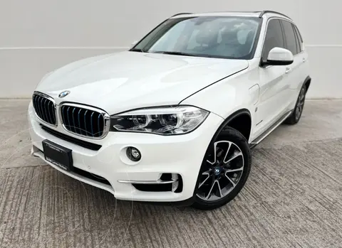 BMW X5 xDrive 40e Excellence (Hibrido) usado (2018) color Blanco Mineral financiado en mensualidades(enganche $236,250 mensualidades desde $24,500)