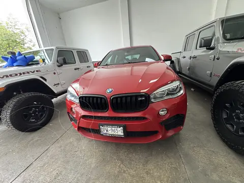 BMW X6 M 4.4L usado (2017) color Rojo financiado en mensualidades(enganche $200,000 mensualidades desde $28,827)