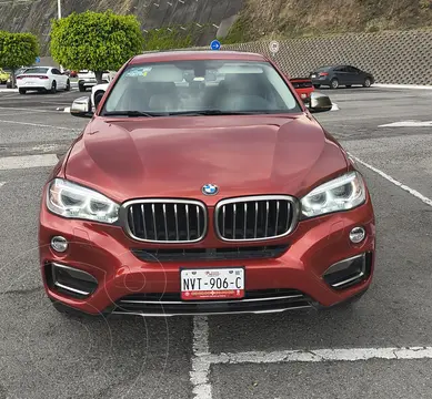 BMW X6 xDrive 35iA Extravagance usado (2017) color Rojo precio $543,000