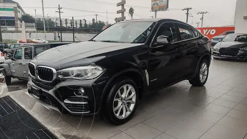 BMW X6 xDrive 35iA usado (2019) color Negro financiado en mensualidades(enganche $136,180 mensualidades desde $13,935)