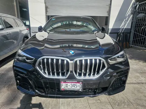 BMW X6 xDrive40i M Sport usado (2023) color Negro financiado en mensualidades(enganche $328,000 mensualidades desde $45,638)
