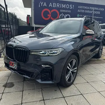 BMW X7 M50i usado (2022) color plateado financiado en mensualidades(enganche $326,728 mensualidades desde $24,985)